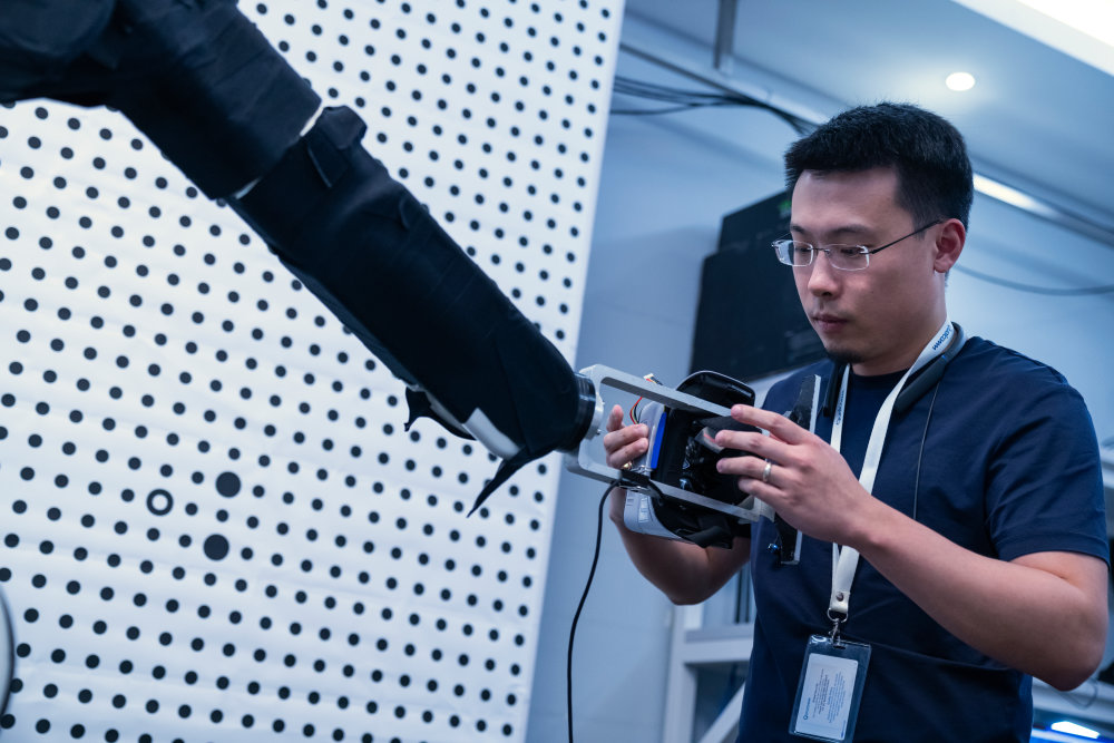 Engineer working in a lab with IoT and 5G technology