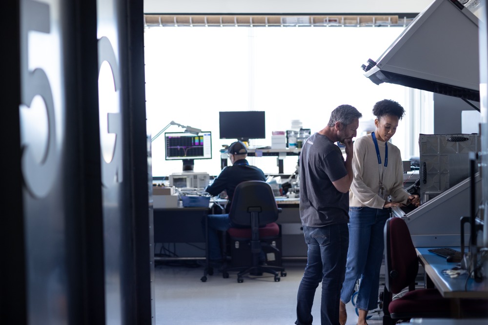 Engineers new to 5G working in 5G lab.