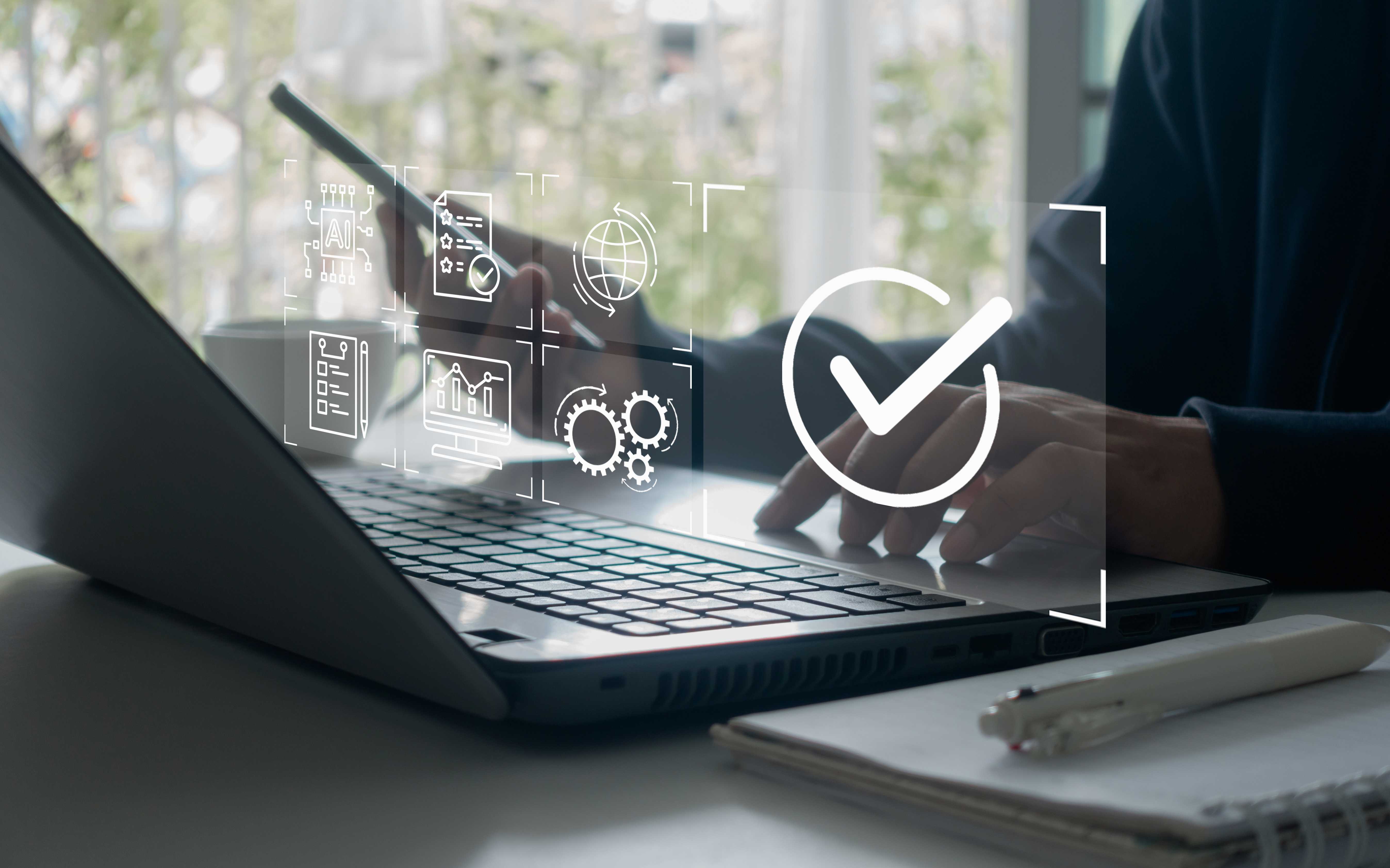 pressing on computer with checkmark icon