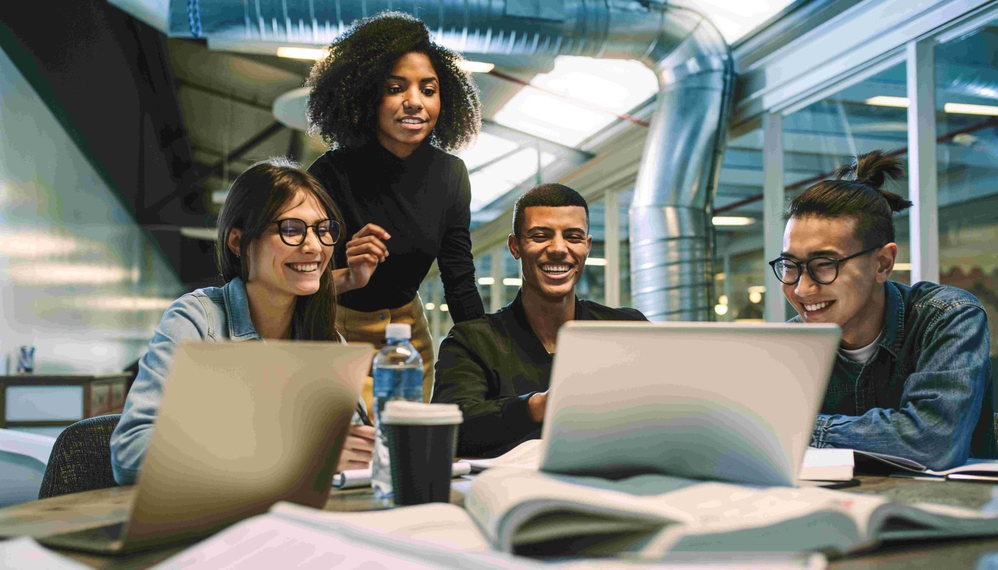 engineers learning 5G at laptop at table